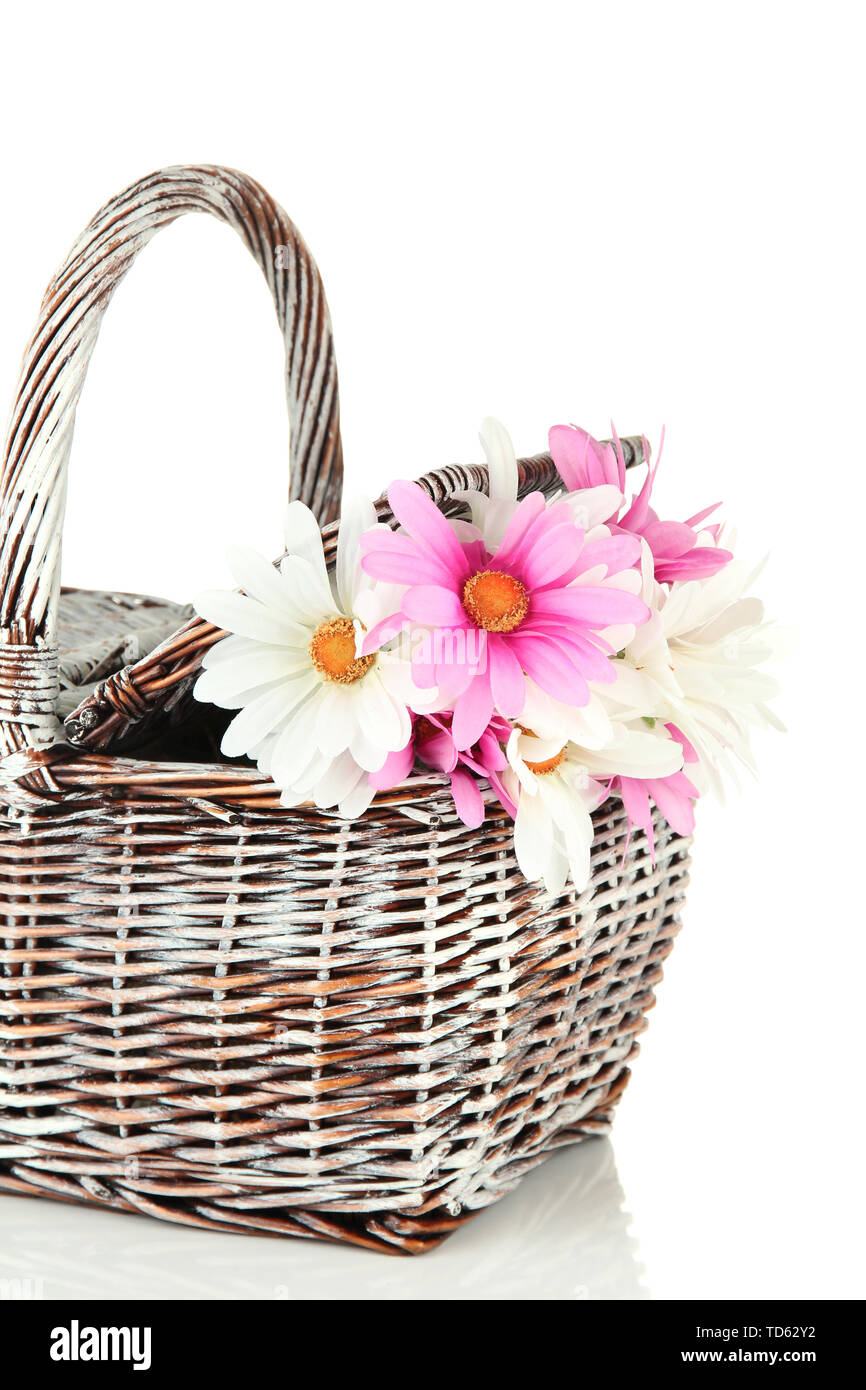Picnic basket with flowers, isolated on white Stock Photo Alamy