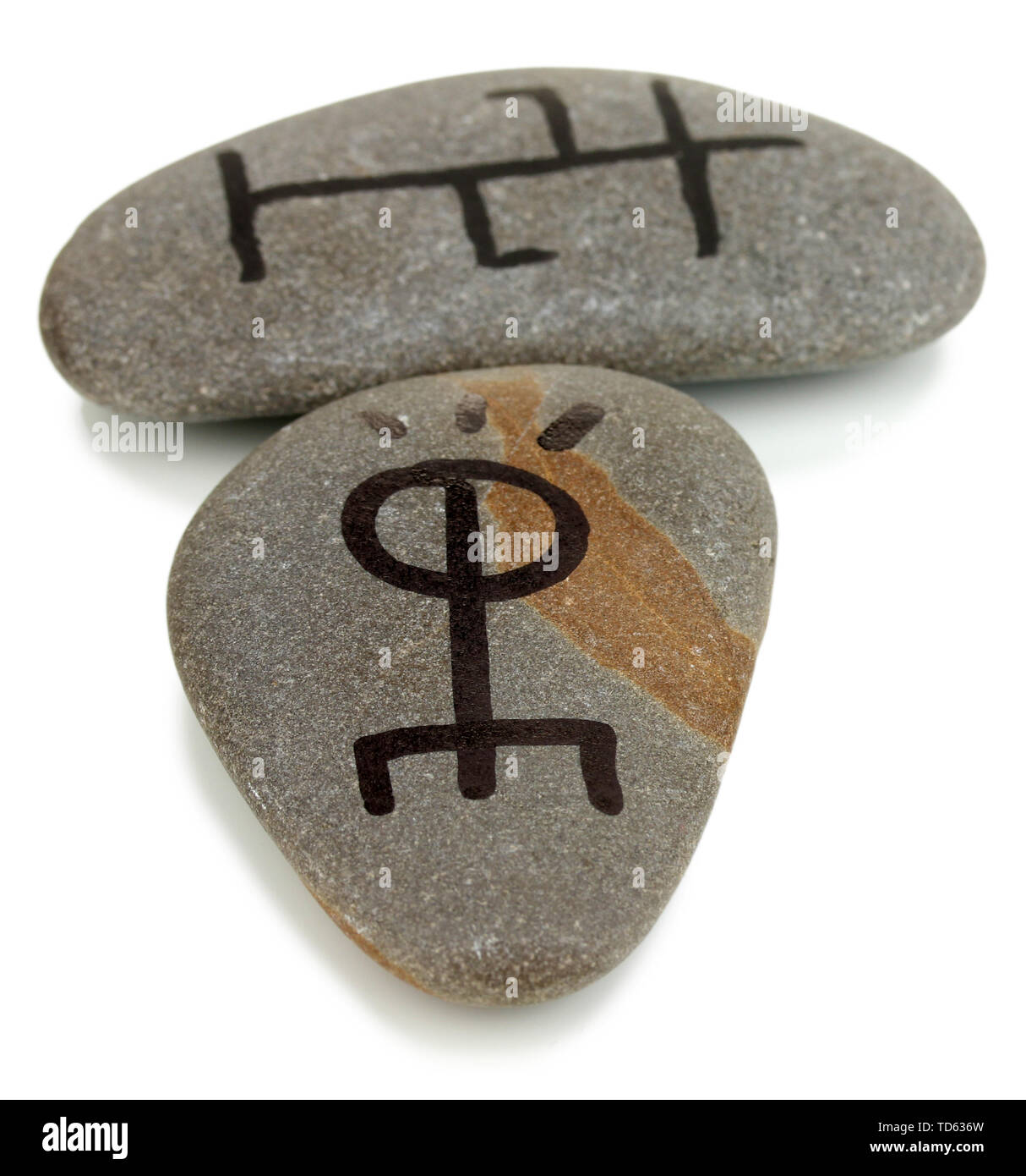 rune stones with black symbols for fortune telling Stock Photo - Alamy