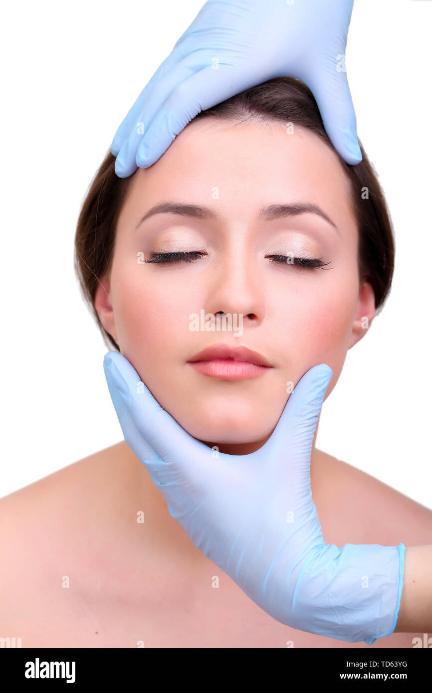 Rubber gloves touching face of young woman close up Stock Photo Alamy