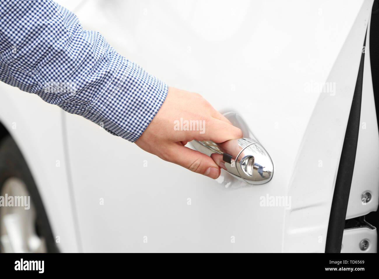 Man hand opening car door, close up Stock Photo Alamy