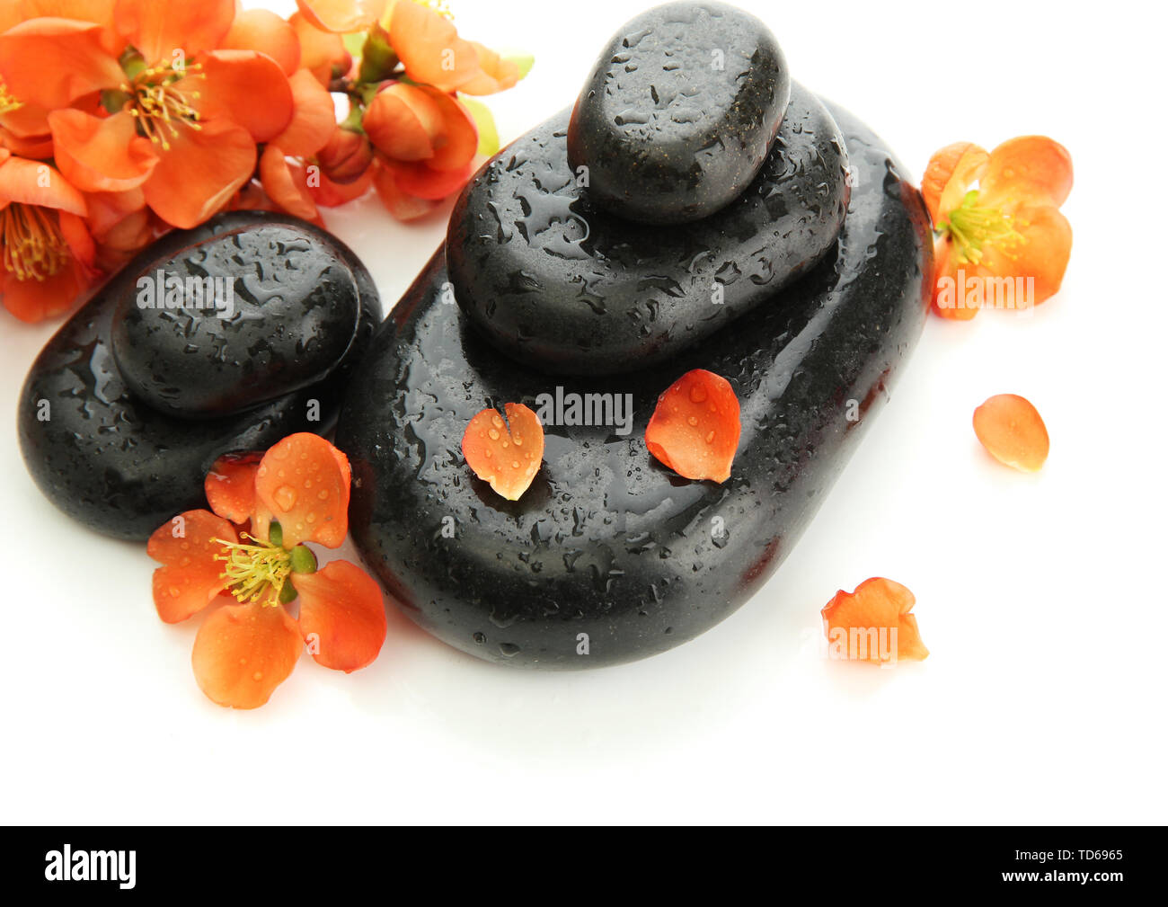 Spa stones and flowers isolated on white Stock Photo - Alamy