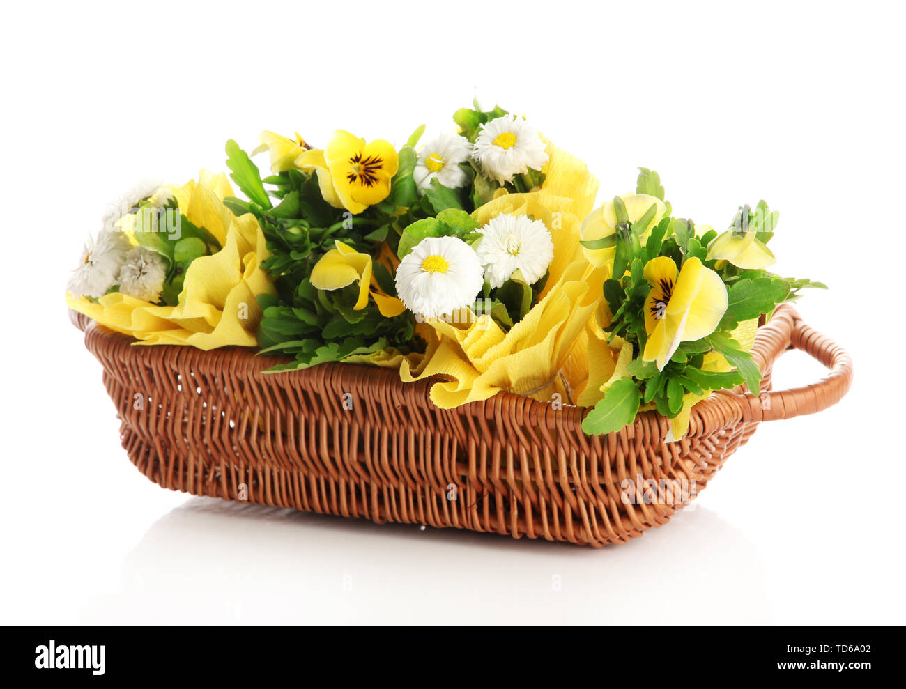 Beautiful spring flowers in basket isolated on white Stock Photo Alamy