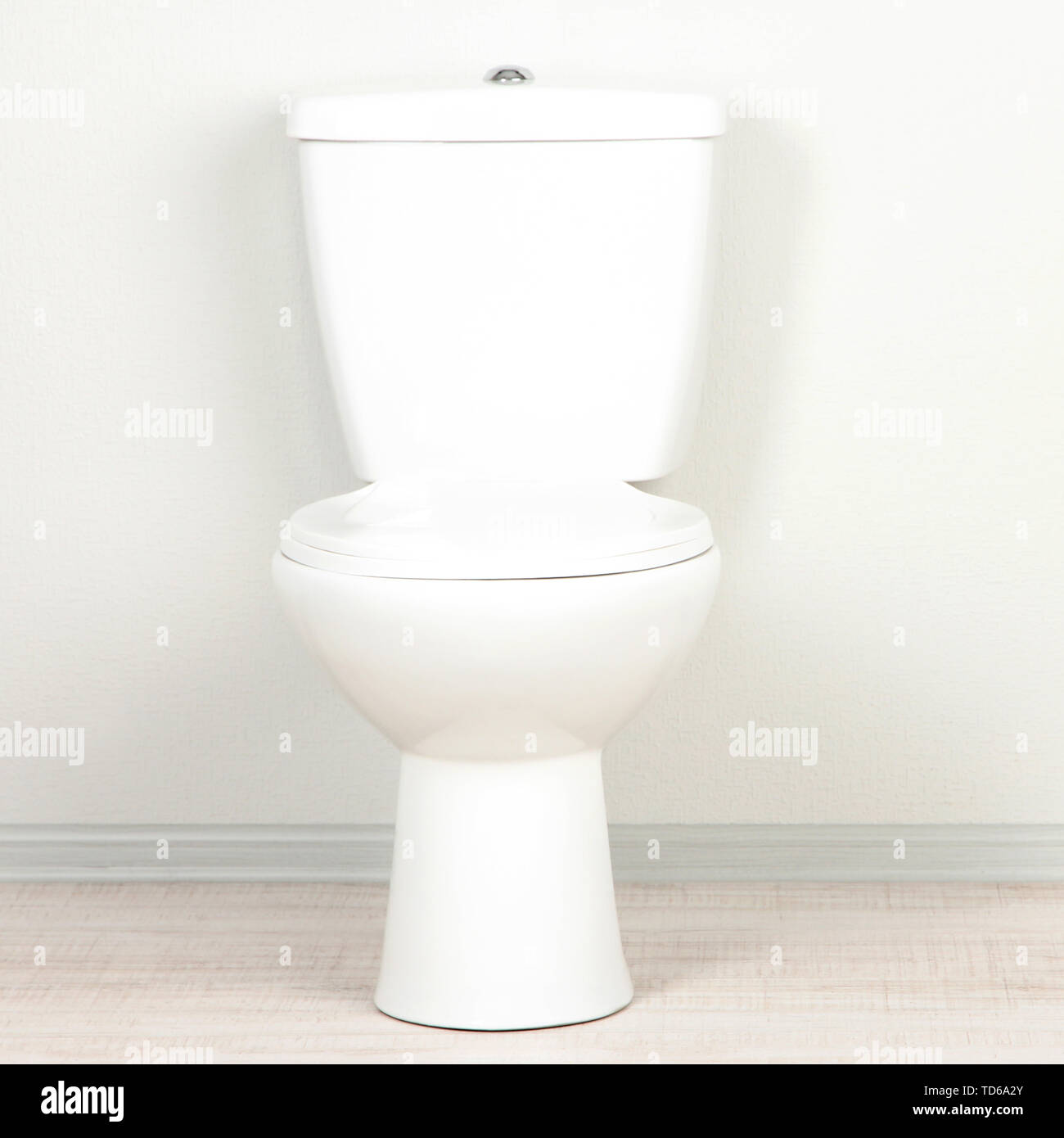 White toilet bowl in a bathroom Stock Photo - Alamy
