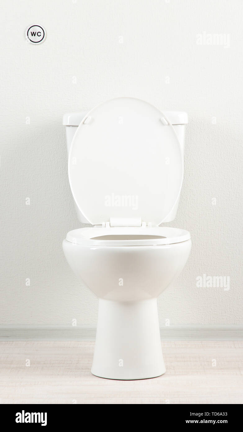 White toilet bowl in a bathroom Stock Photo - Alamy