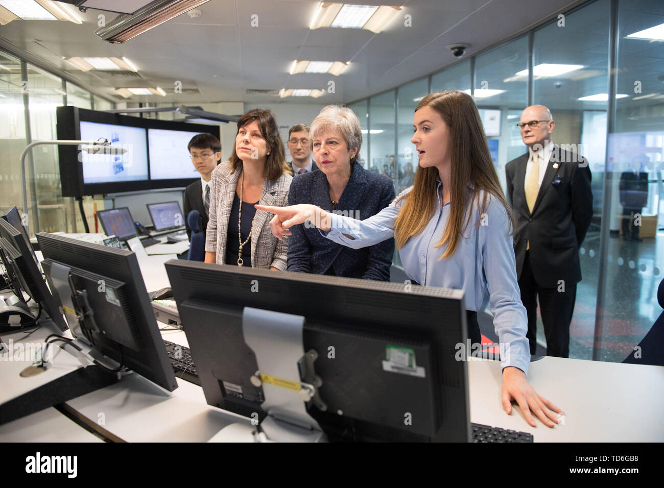 Prime Minister Theresa May during a visit to Imperial College in London where she saw machinery which converts carbon dioxide into oxygen after her announcement that the UK is to set a legally binding target to end its contribution to climate change by 2050. Stock Photo