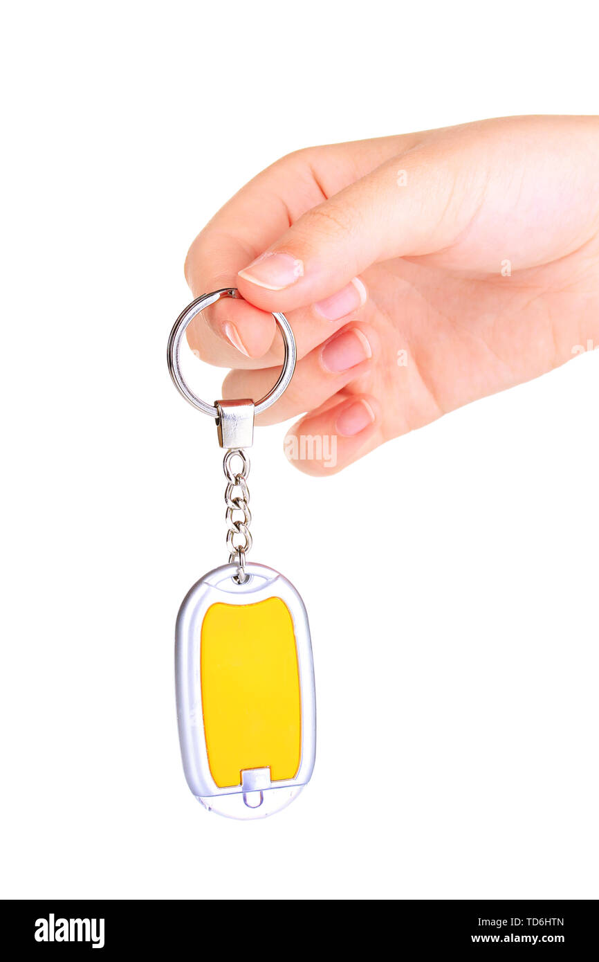 Keychain in hand isolated on white Stock Photo - Alamy