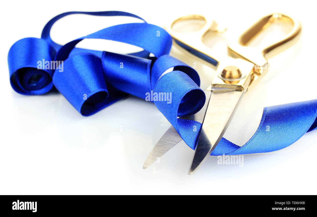 Satin ribbon curled around scissors isolated on white Stock Photo - Alamy