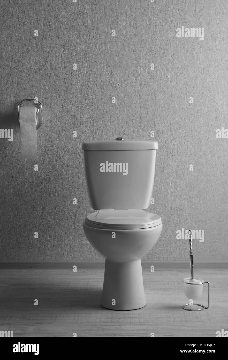 White toilet bowl in a bathroom Stock Photo - Alamy