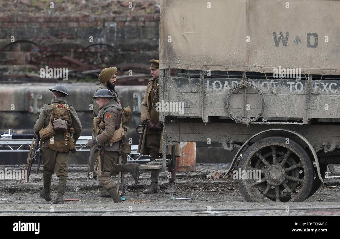 Actors on the set during filming of director Sam Mendes new film 1917 at Govan Docks in Glasgow. Stock Photo