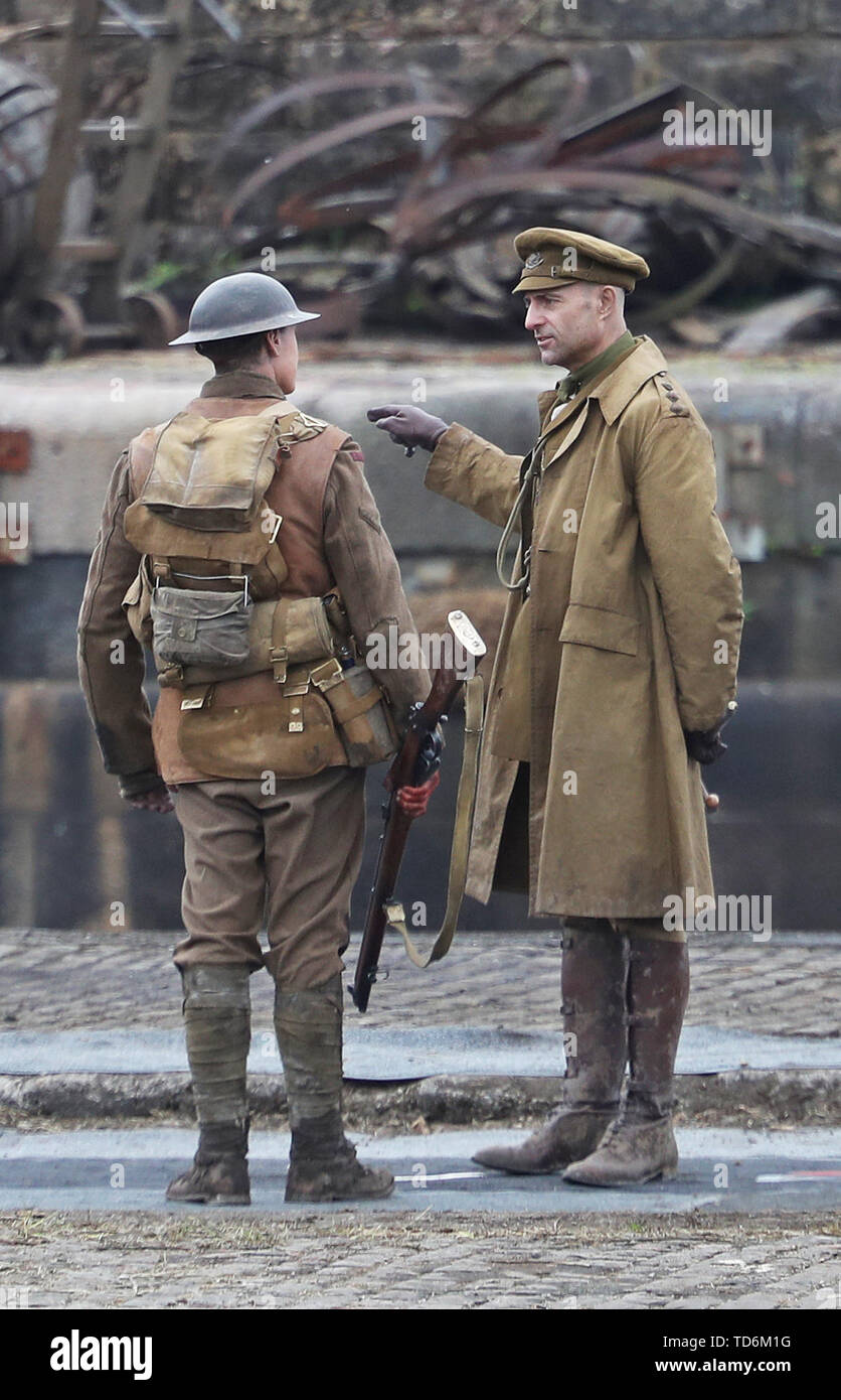 Actors Mark Strong (right) and George Mackay on set of Sam Mendes new film 1917 during filming at Govan Docks in Glasgow. Stock Photo