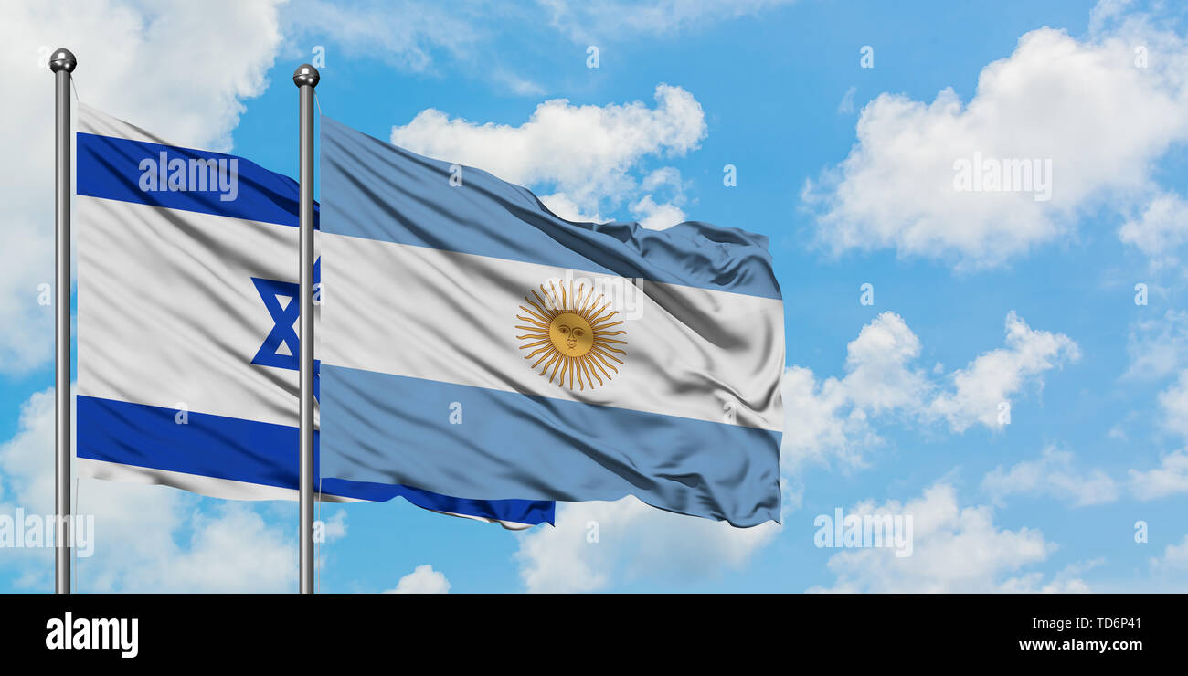 Israel and Argentina flag waving in the wind against white cloudy blue ...