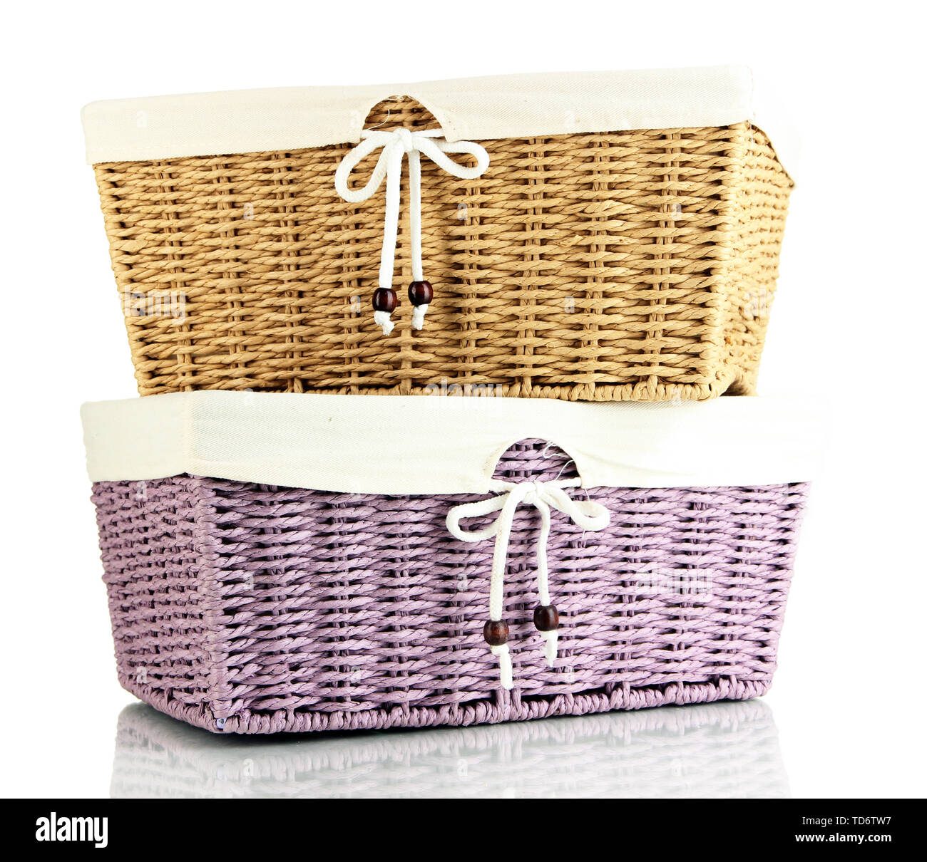 Two empty color wicker baskets, isolated on white Stock Photo