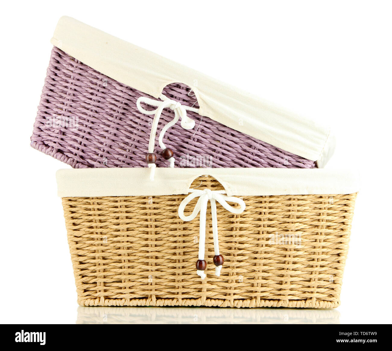 Two empty color wicker baskets, isolated on white Stock Photo