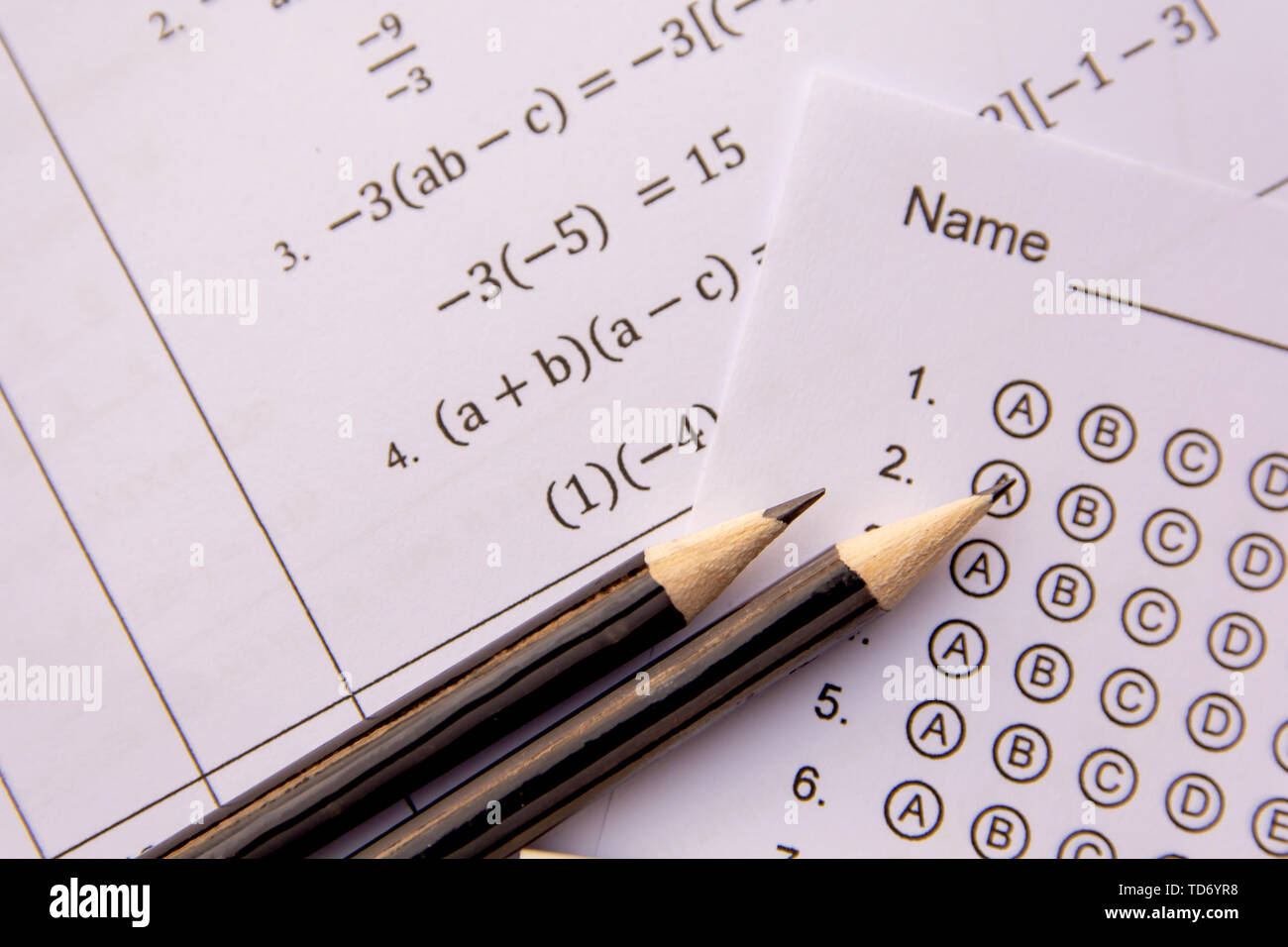 Pencil on answer sheets or Standardized test form with answers bubbled