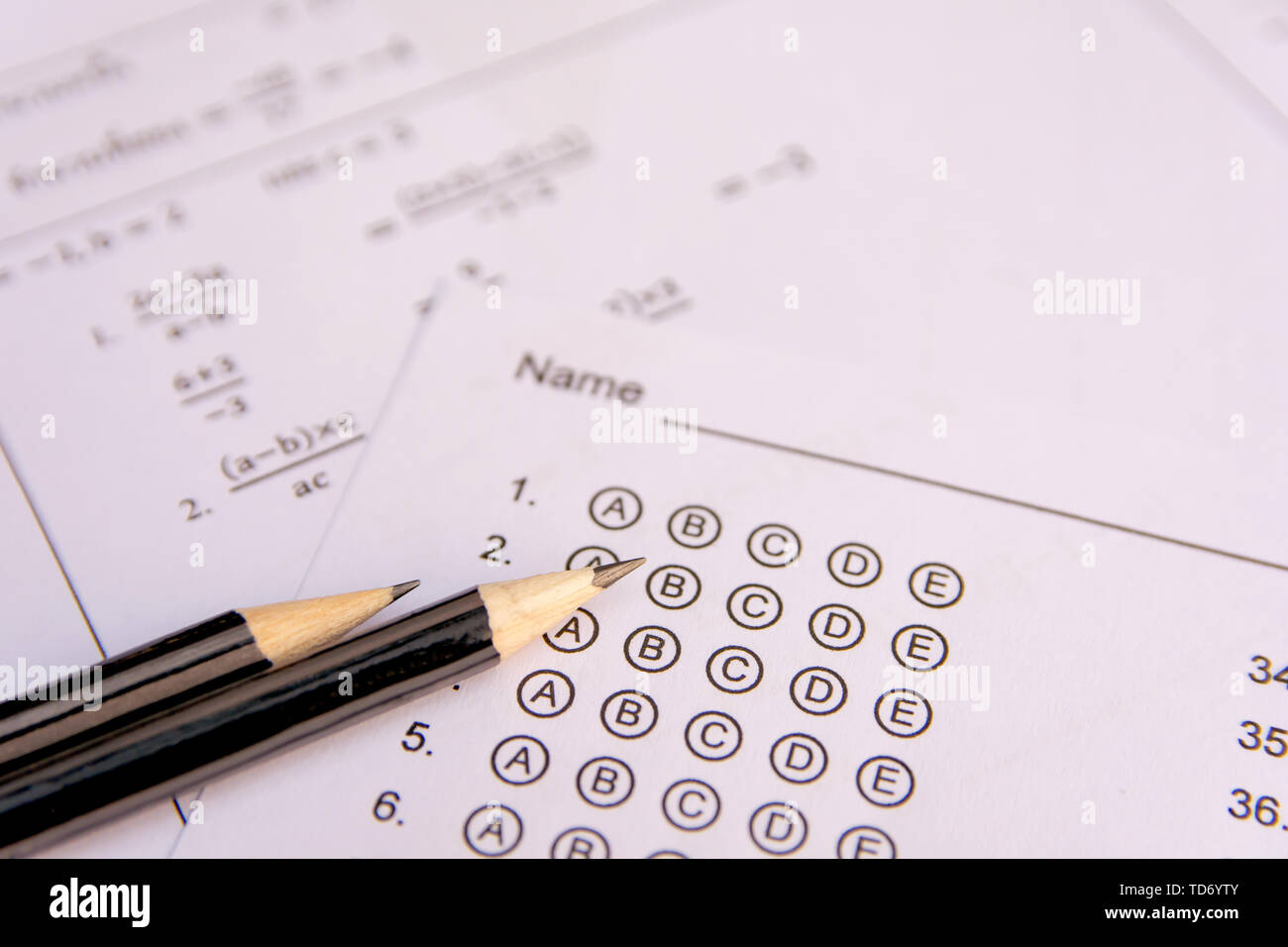 Pencil on answer sheets or Standardized test form with answers bubbled