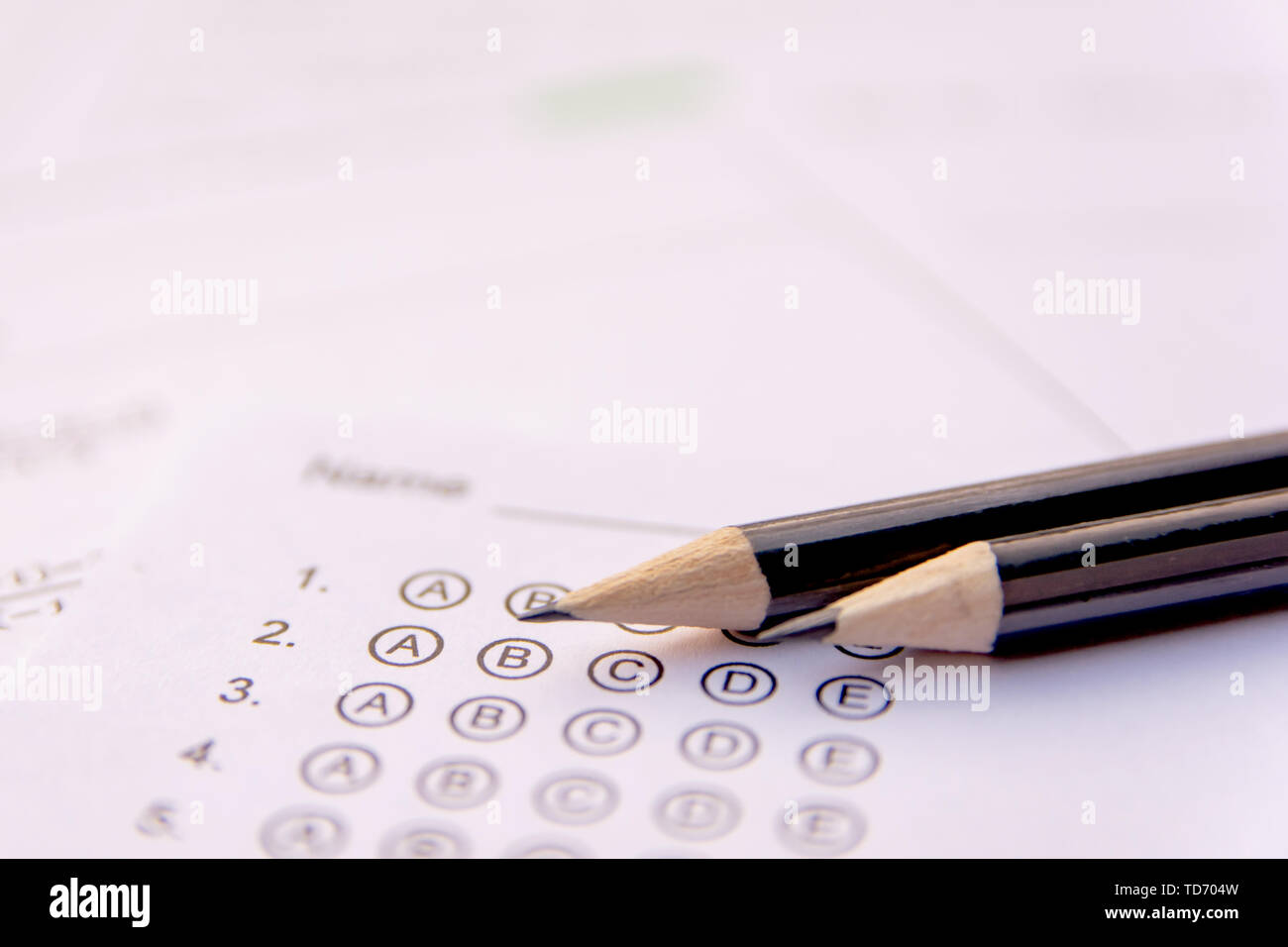 Pencil on answer sheets or Standardized test form with answers bubbled