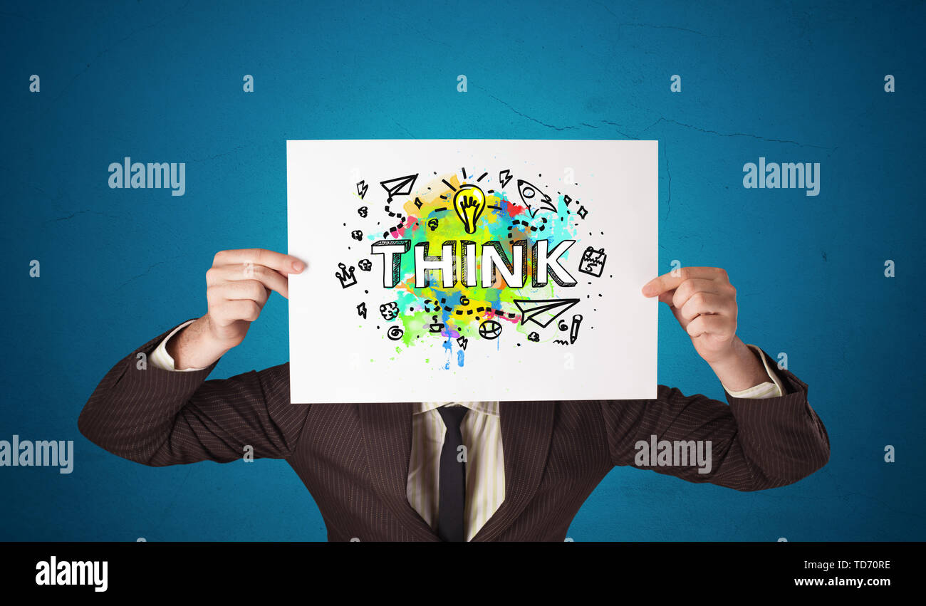 Young person holding paper with design thinking concept Stock Photo - Alamy