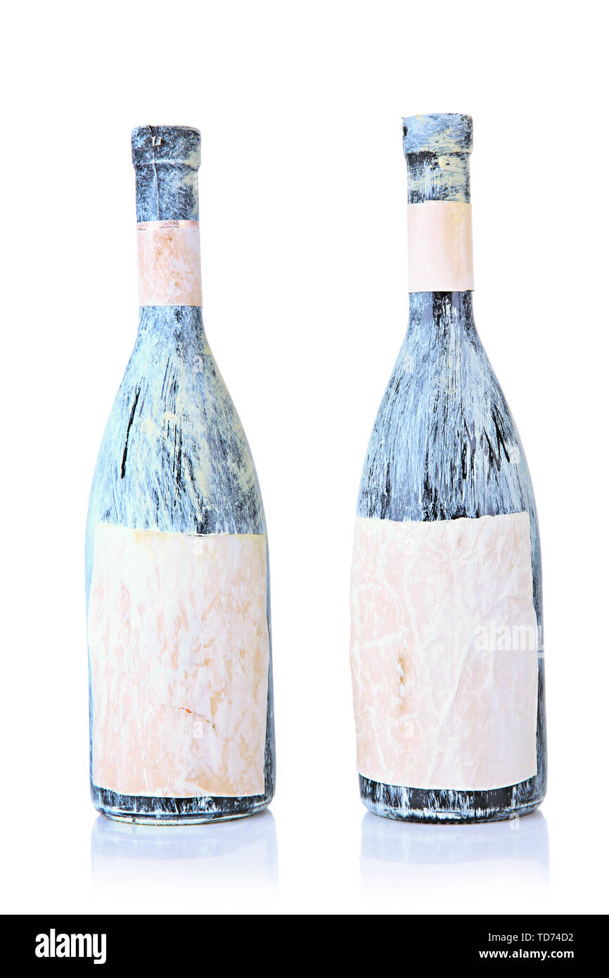 Old bottles of wine, isolated on white Stock Photo Alamy