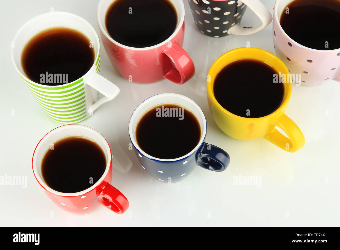 Many cups of coffee isolated on white Stock Photo - Alamy