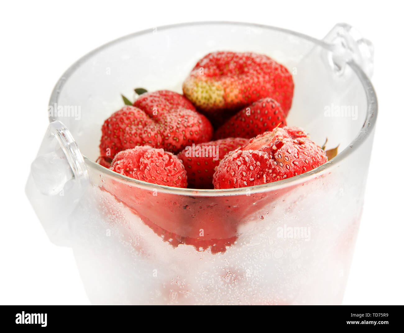 Frozen strawberries in bucket of ice isolated on white Stock Photo - Alamy