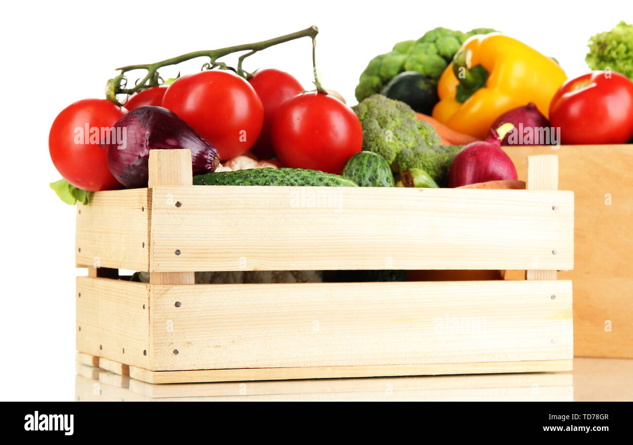 Fresh vegetables in wooden boxes on white background Stock Photo - Alamy