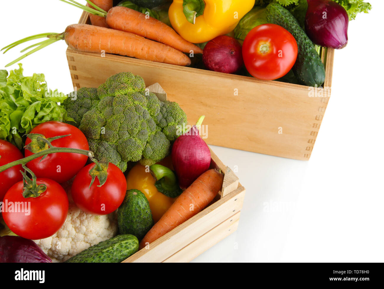 Fresh vegetables in wooden boxes on white background Stock Photo - Alamy