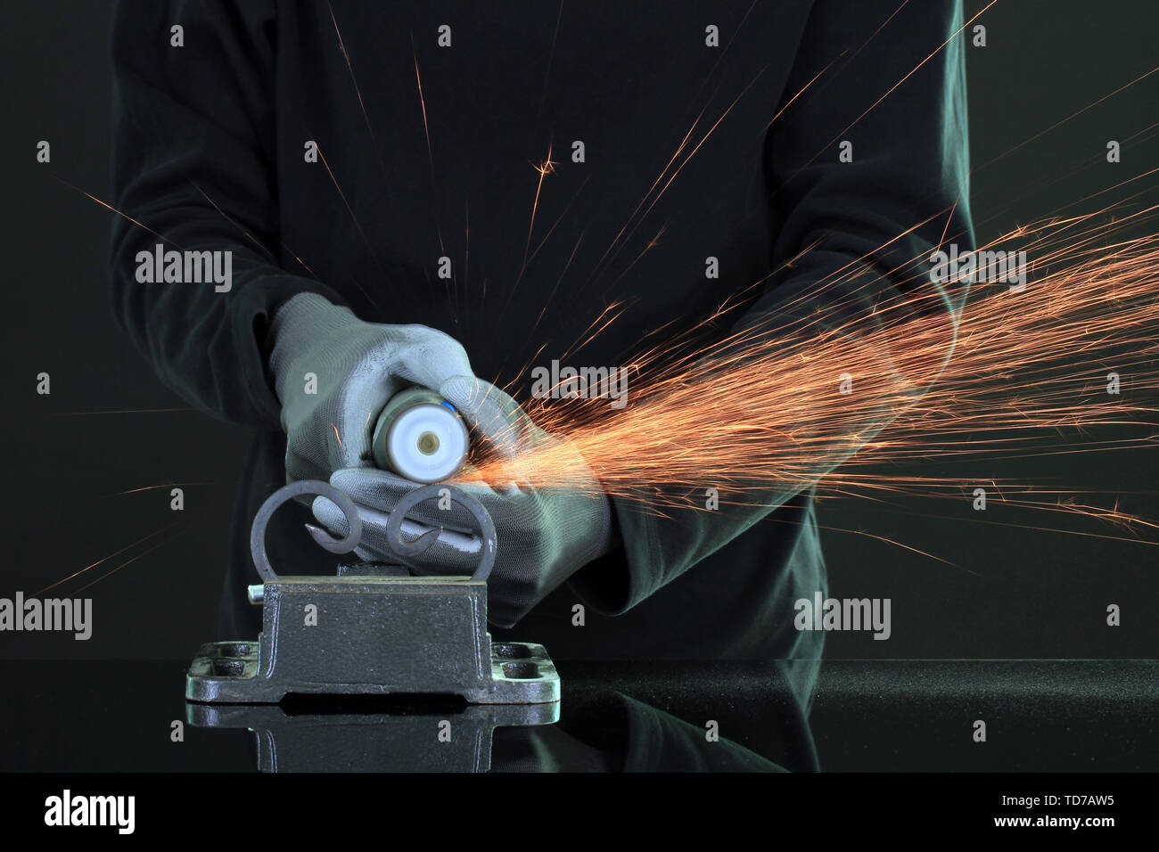 Turner working, close-up, isolated on black Stock Photo