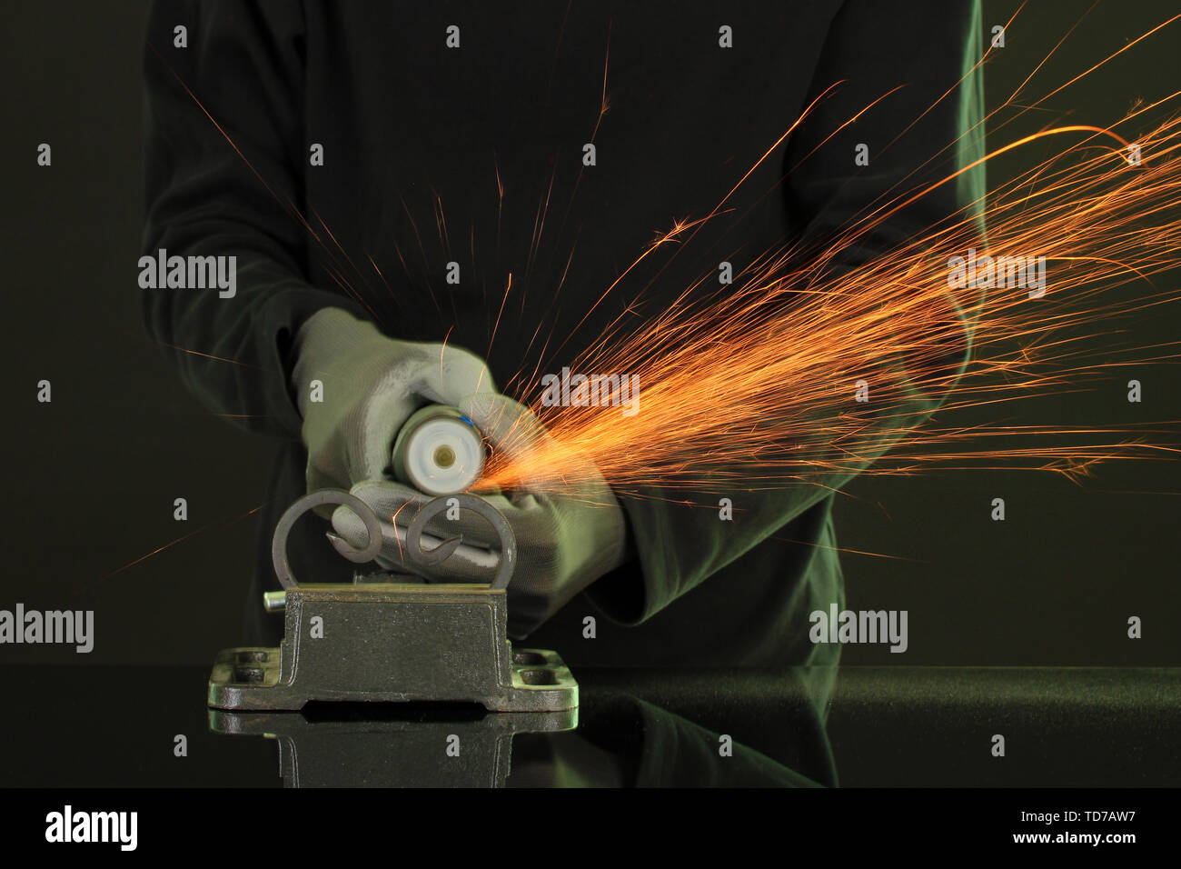 Turner working, close-up, isolated on black Stock Photo