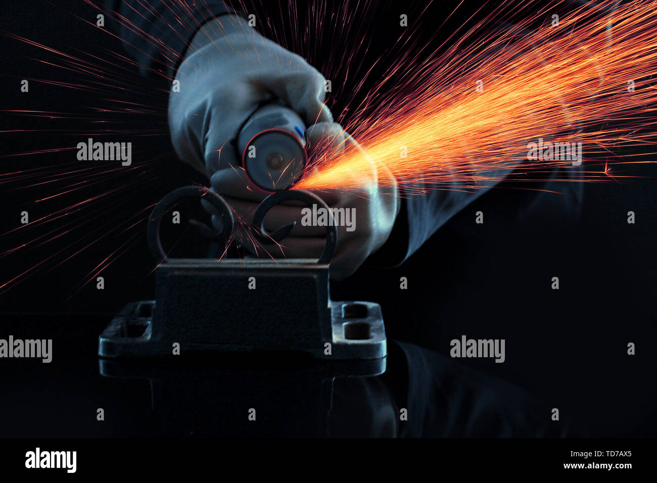 Turner working, close-up, isolated on black Stock Photo