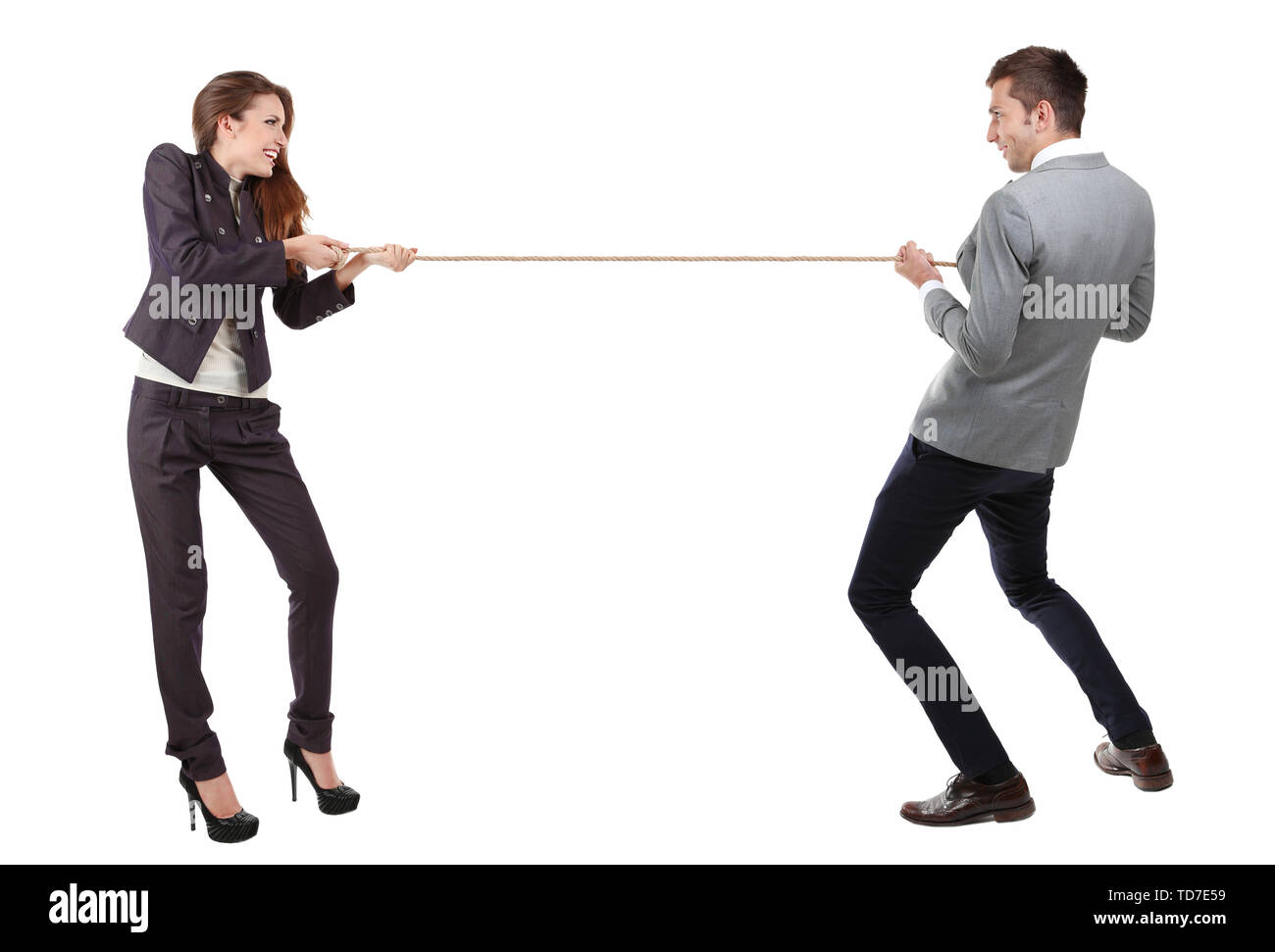 Business people stretching rope isolated on white Stock Photo - Alamy