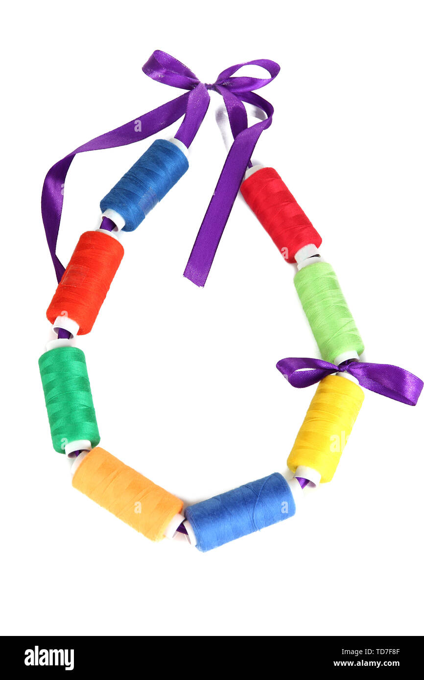 Colored threads on bright ribbon isolated on white Stock Photo Alamy