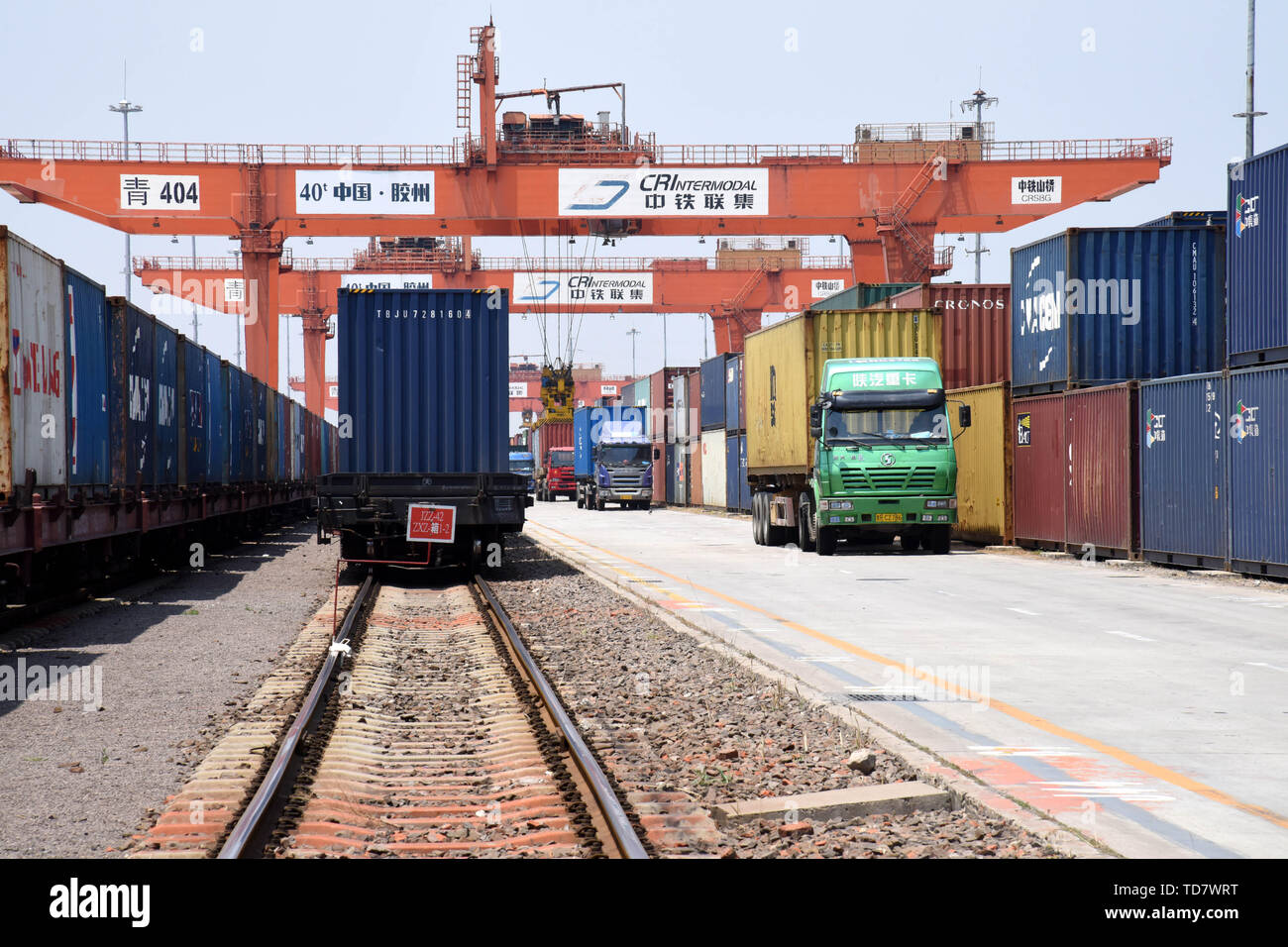 Qingdao, China. 12th June, 2019. Photo taken on June 12, 2019 shows the containers at the Qingdao multimodal transportation center at a demonstration zone for China-SCO local economic and trade cooperation in Jiaozhou City, east China's Shandong Province. Credit: Li Ziheng/Xinhua/Alamy Live News Stock Photo