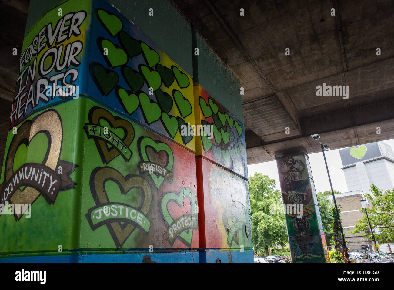 London, UK. 13 June, 2019. Murals underneath the Westway close to the Grenfell Tower in North Kensington. Tomorrow, the Grenfell community will mark the second anniversary of the Grenfell Tower fire on 14th June 2017 in which 72 people died and over 70 were injured. Two years on, some family members remain in temporary accommodation and many are still traumatised. Phase 2 of the Grenfell Inquiry will begin in 2020, with criminal investigation findings expected to be sent to the Crown Prosecution Service in 2021. Credit: Mark Kerrison/Alamy Live News Stock Photo