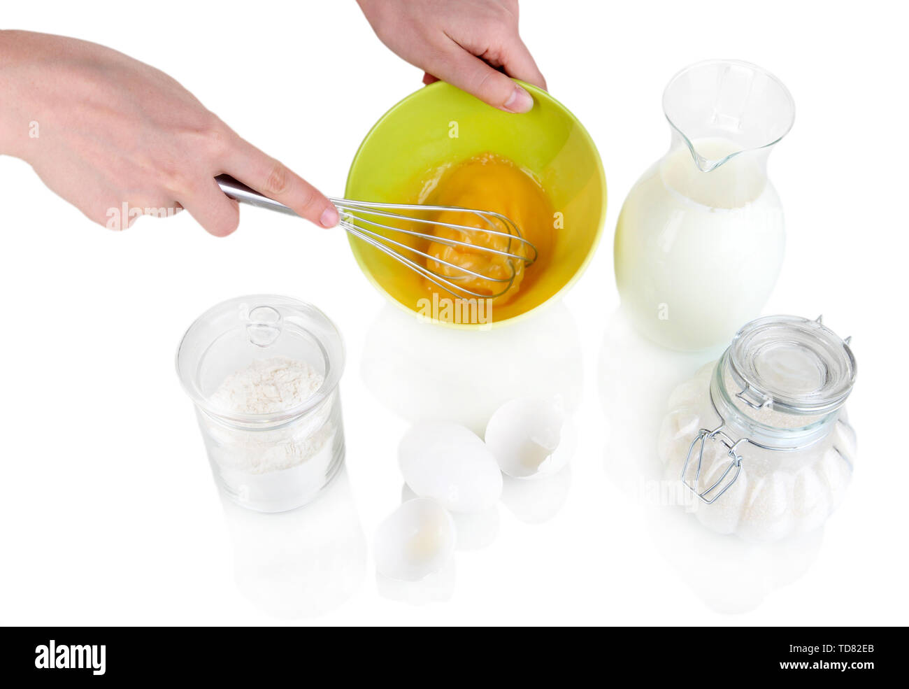 Whisking eggs isolated on white Stock Photo Alamy