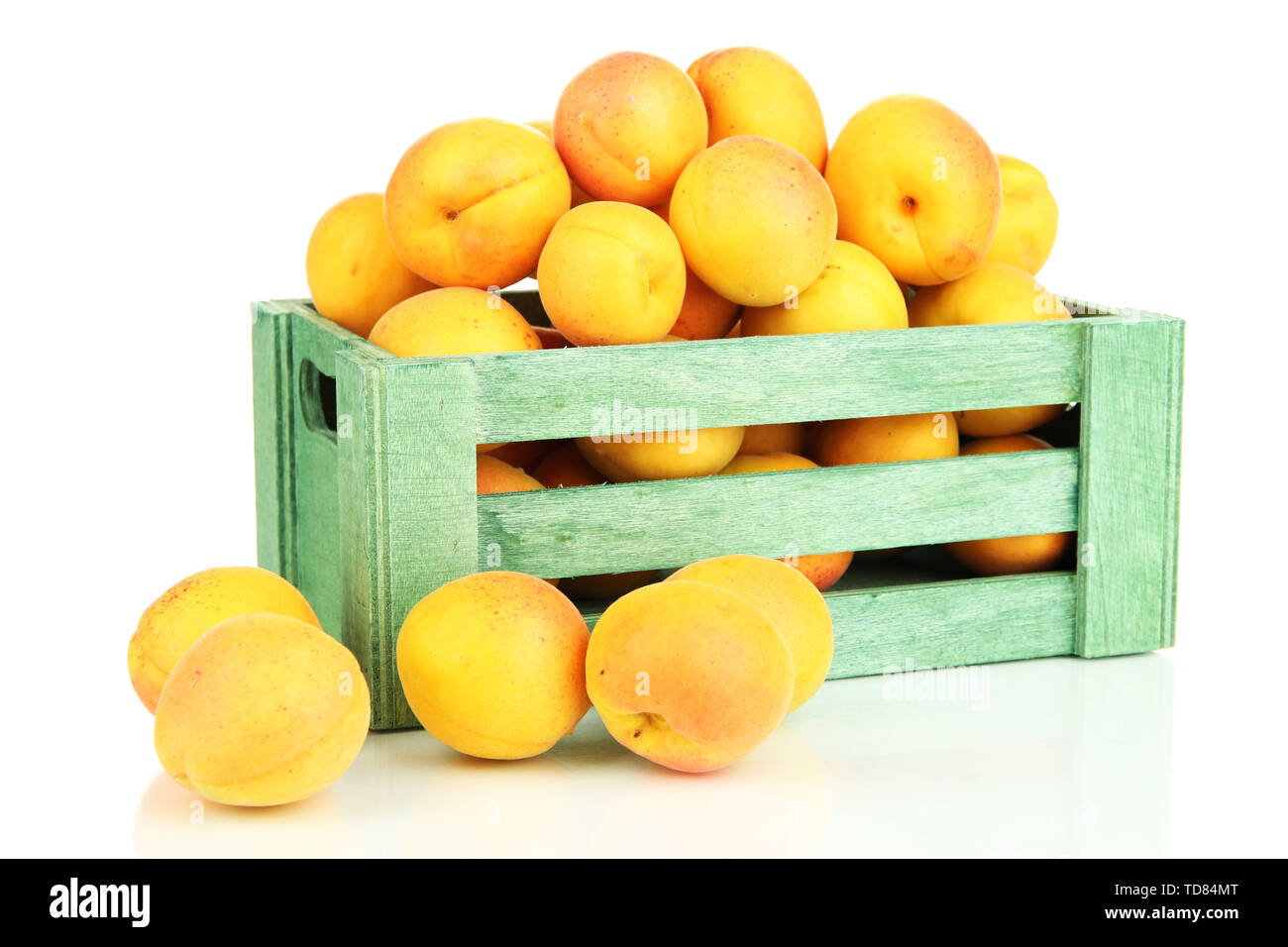 Fresh natural apricot in wooden box isolated on white Stock Photo - Alamy