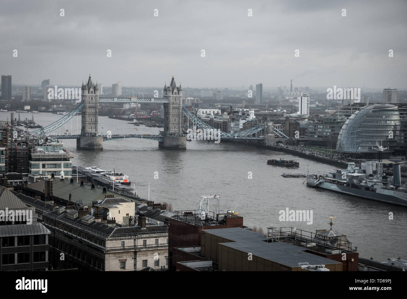 An aerial view from tower bridge, London. It was a typically cloudy day in London. Stock Photo