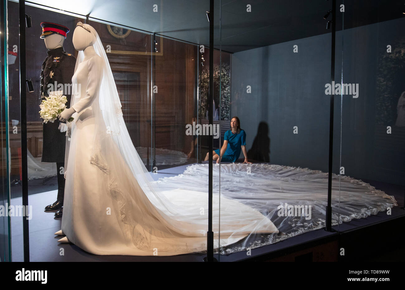Curator Caroline de Gauitaut puts the finishing touches to a special exhibition 'A Royal Wedding: The Duke and Duchess of Sussex' featuring a display of their Royal Highnesses' wedding outfits at the Palace of Holyroodhouse, Edinburgh. The exhibition will open to the public on Friday June 14, 2019. Stock Photo
