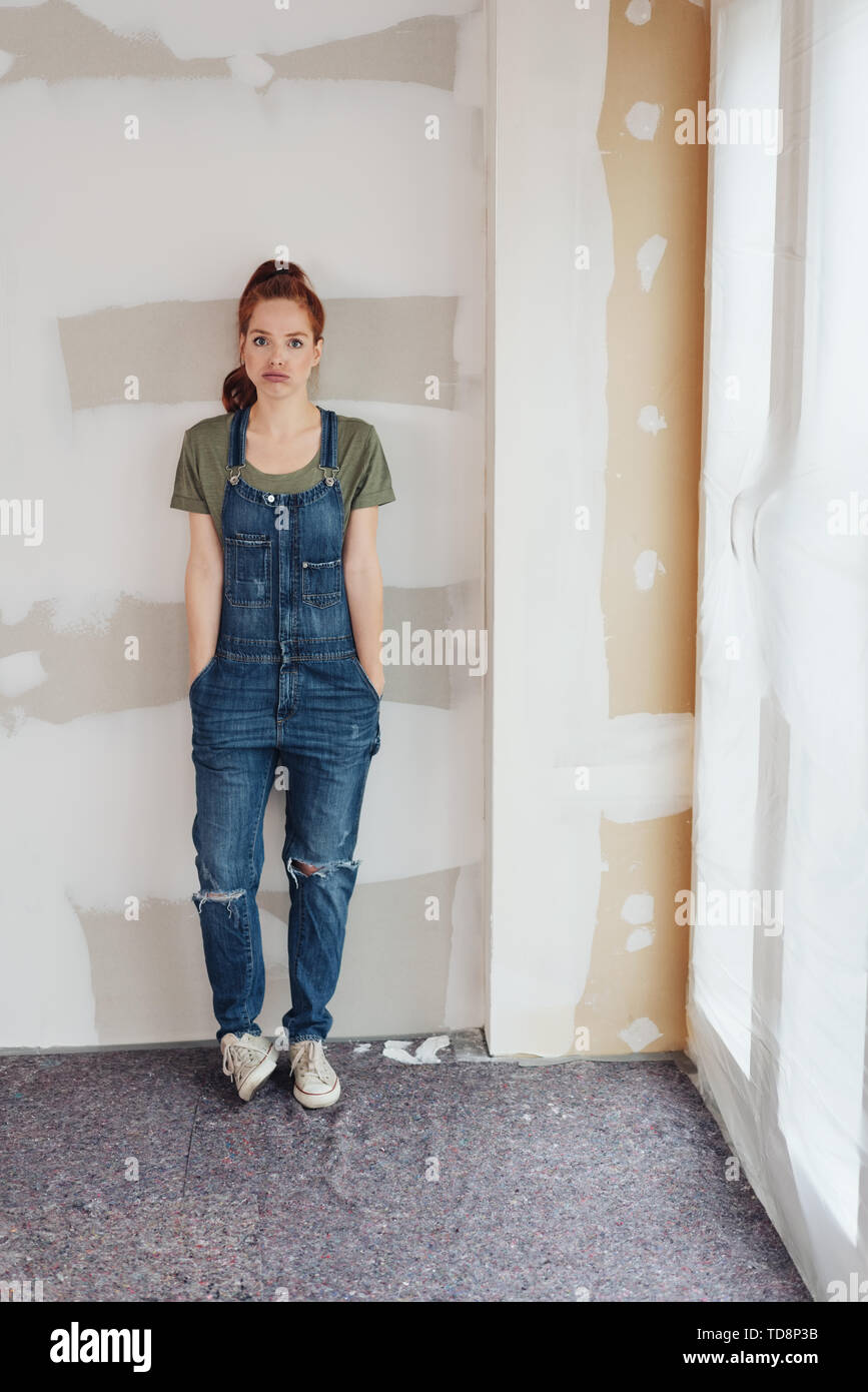 Wearing denim dungarees hi-res stock photography and images - Alamy