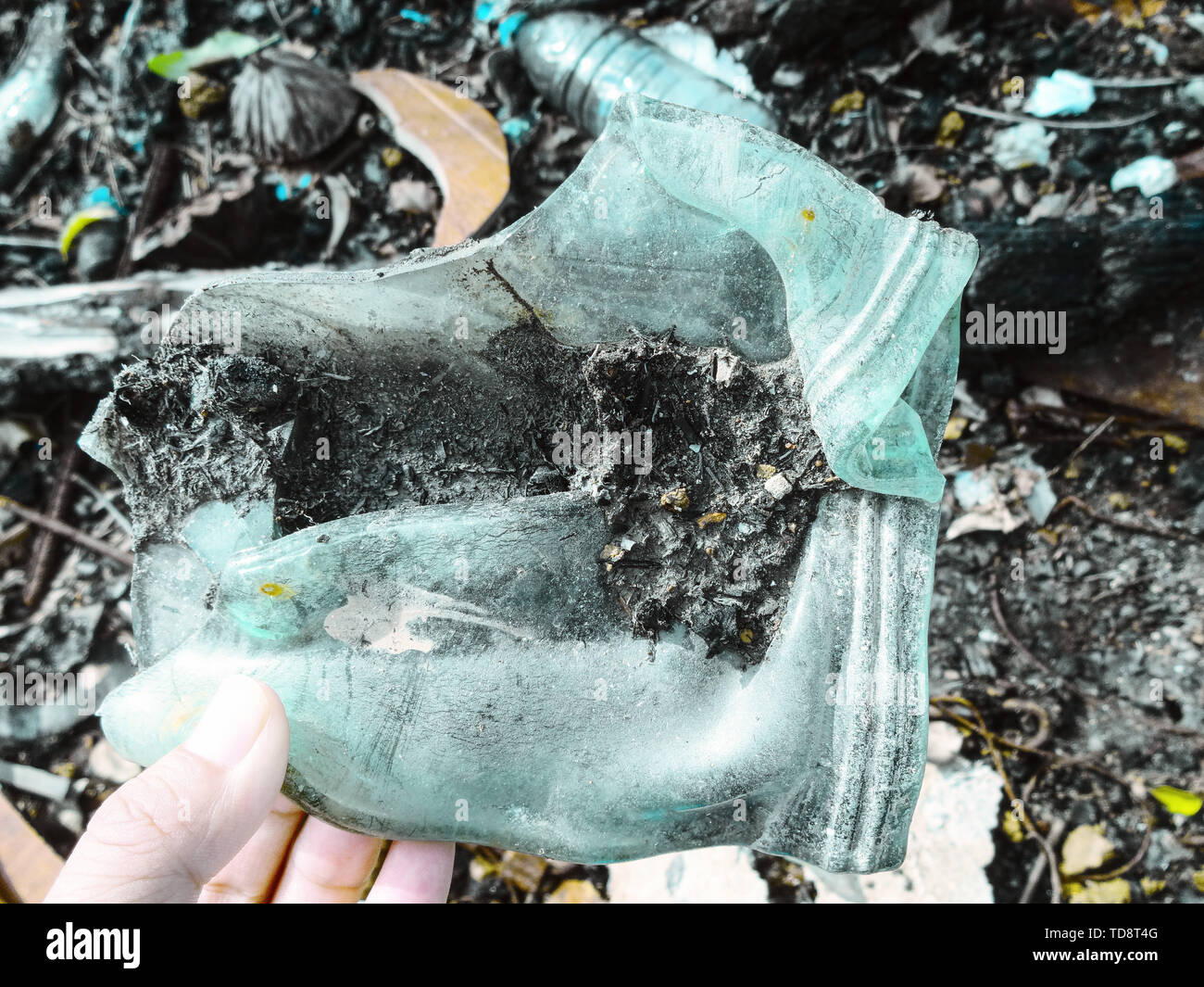 Burned, melted glass cans Stock Photo Alamy