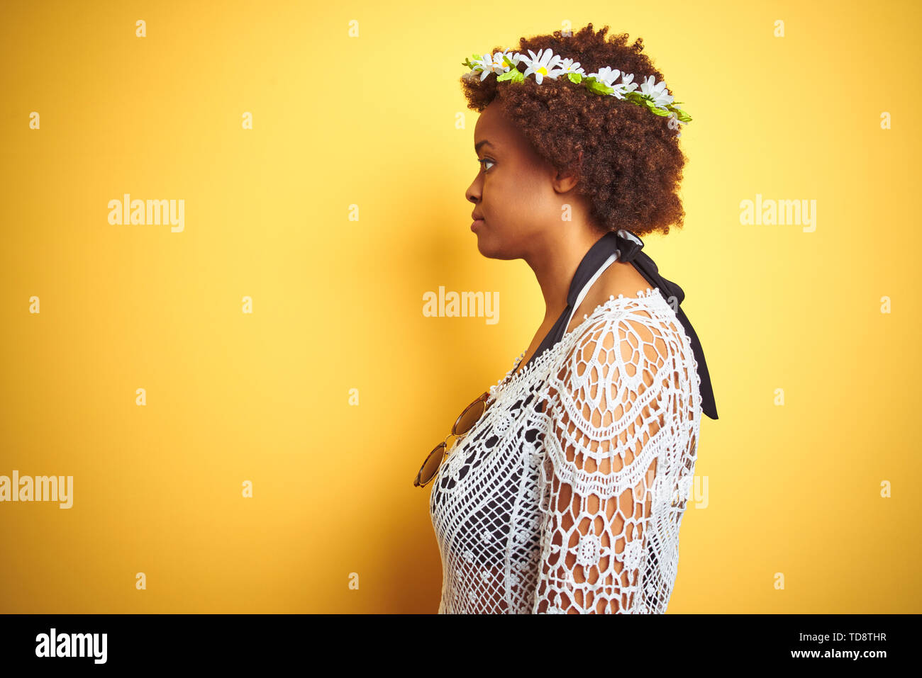 Young African American Woman With Afro Hair Wearing Flowers Crown