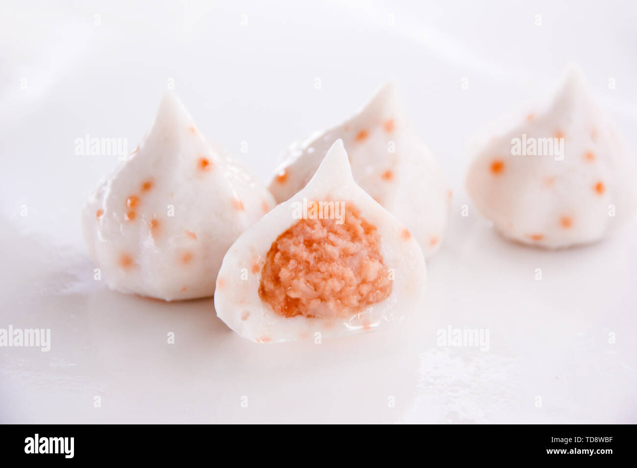 Fish balls stuffed white cheese fish balls color brushed fish balls red fish  seeds fish roe triangle fish balls food hotpot ingredients spicy hot  Guandong cooking food close-up Stock Photo - Alamy
