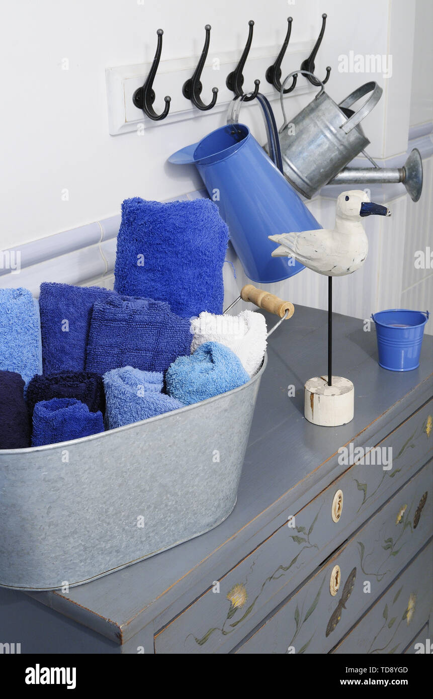 Hand painted decoration on fronts of chest of drawers hires stock