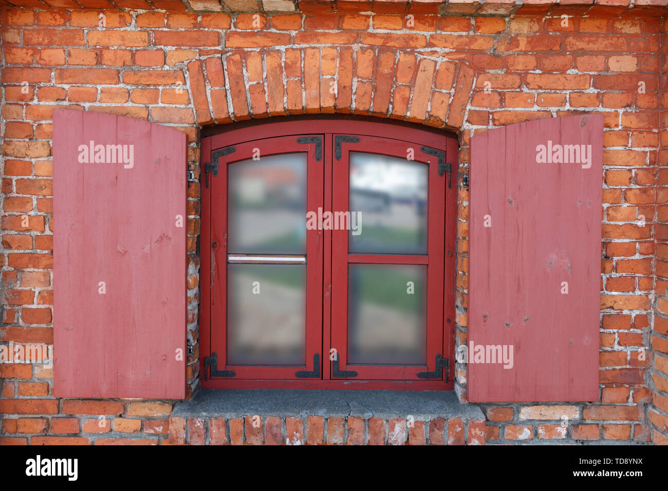 Classic wooden window with shutters on red brick wall Stock Photo - Alamy