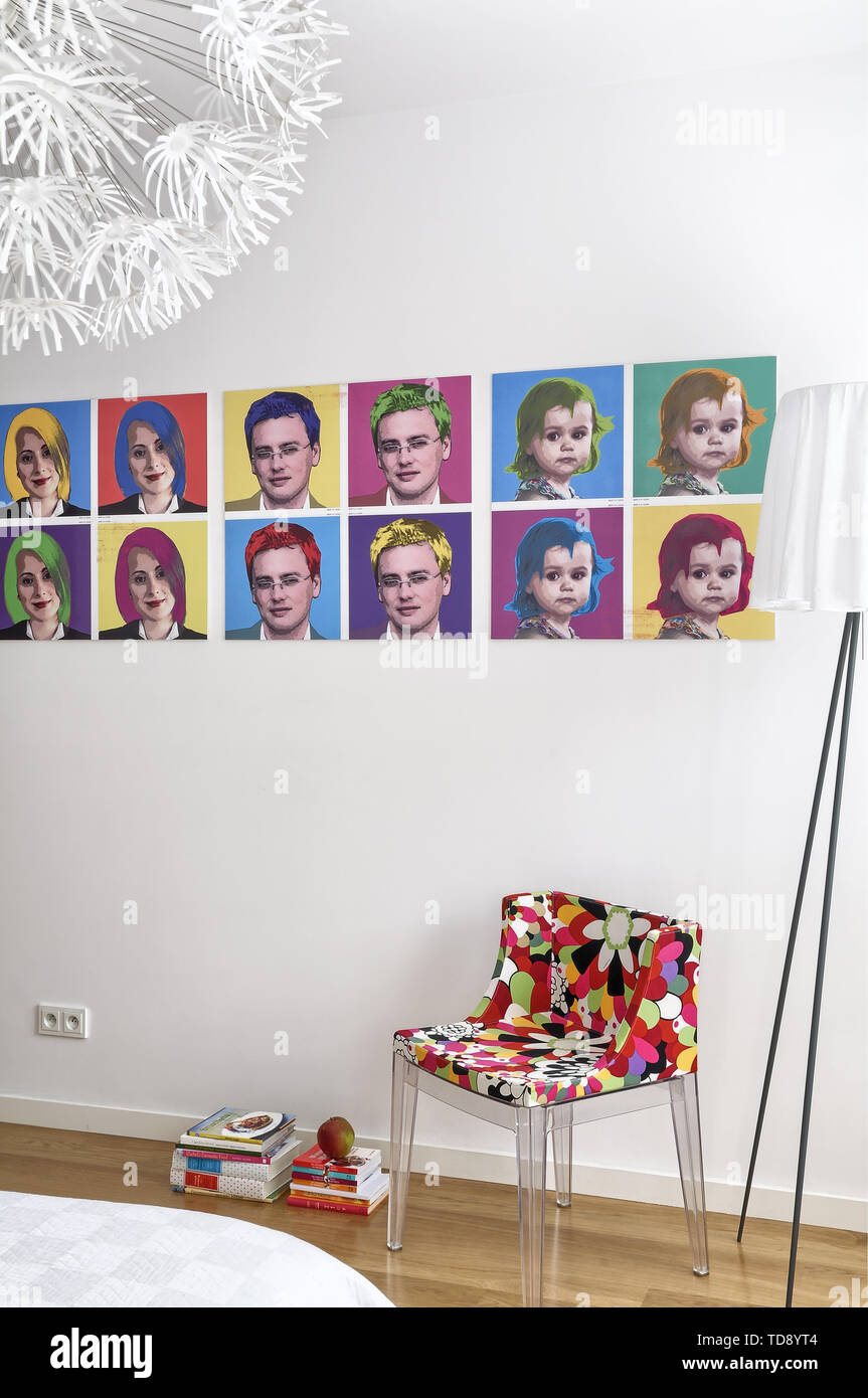 Andy Warhol inspired pop art family portraits on bedroom wall   UK & IRISH USE ONLY Stock Photo