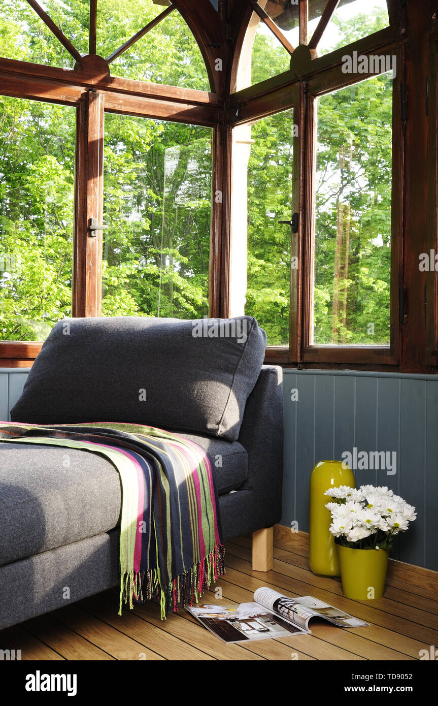 Grey chaise longue in corner of country style room UK AND IRISH RIGHTS