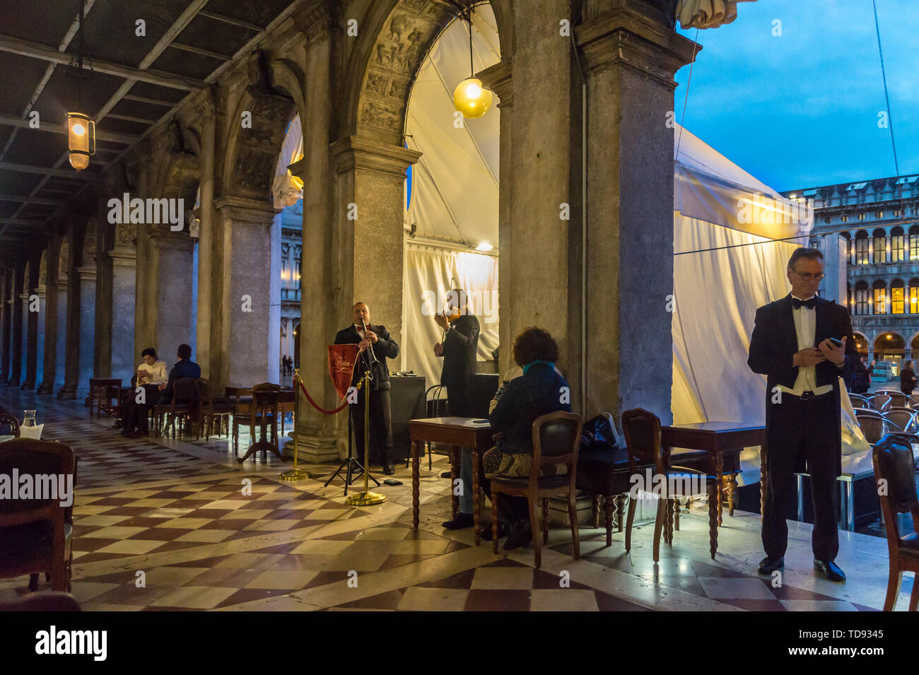 Musicians  at Caffè Florian, St. Mark's Square, San Marco, Venice, at dusk, Veneto, Italy Stock Photo