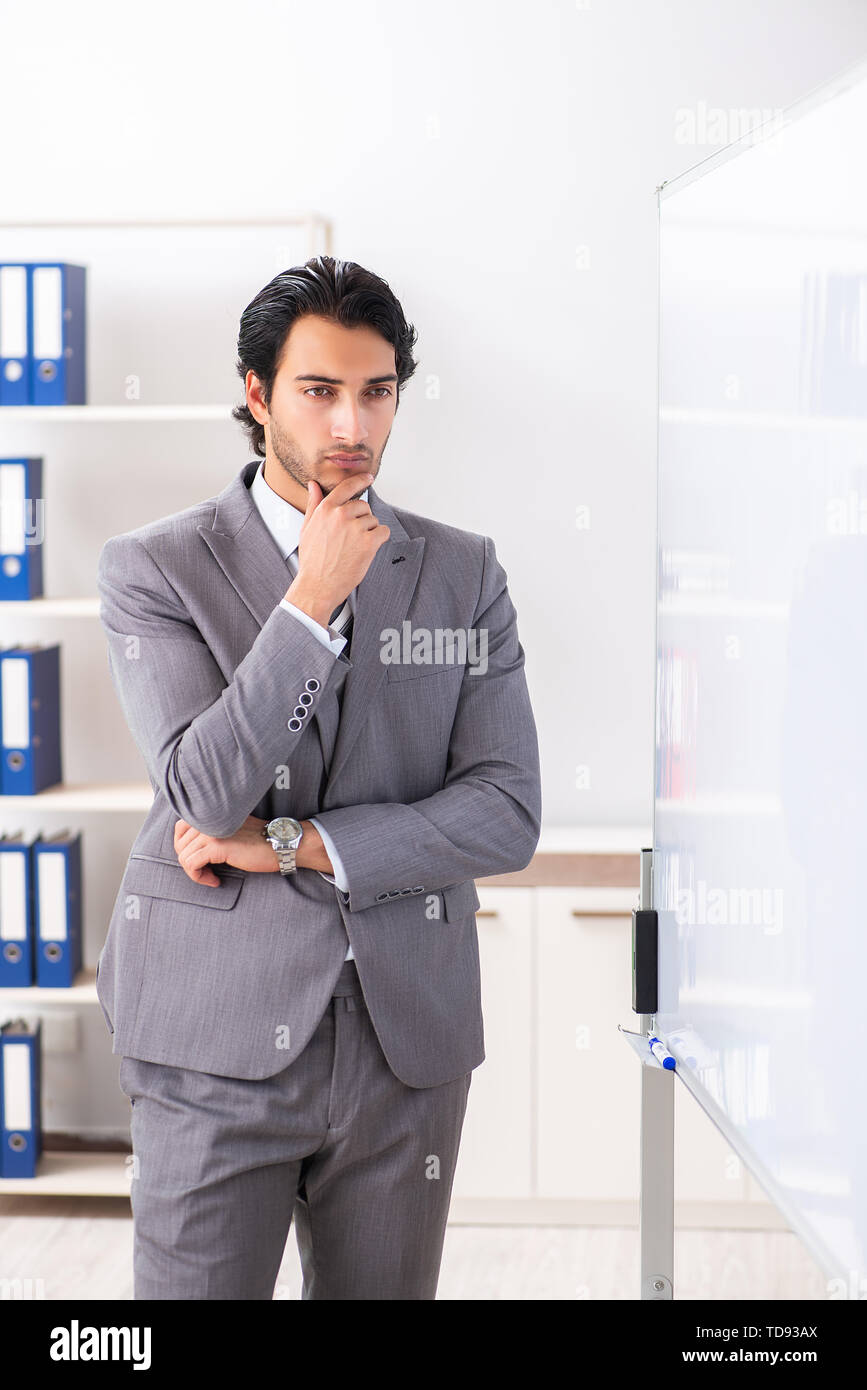 Focused businessman presenting company strategy hi-res stock ...