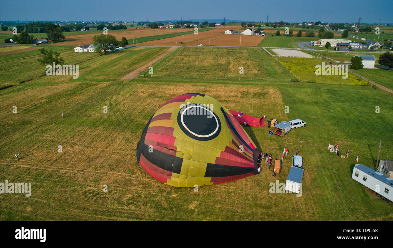 Aerial View of Hot Air Balloons Trying to Launch in a Wind as Seen by a Drone Stock Photo