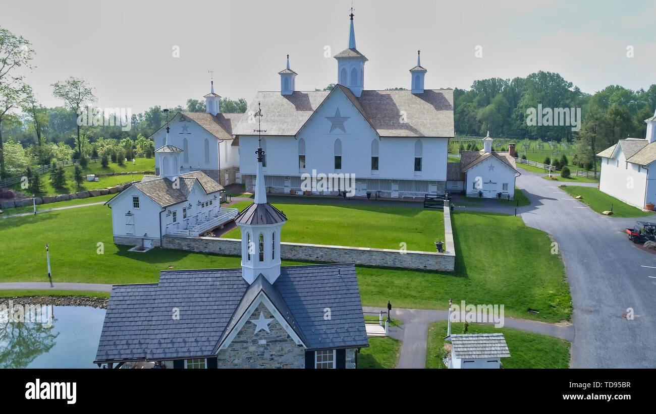 Aerial View Of A Old Barns With Steeple Or Cupola As Seen By A