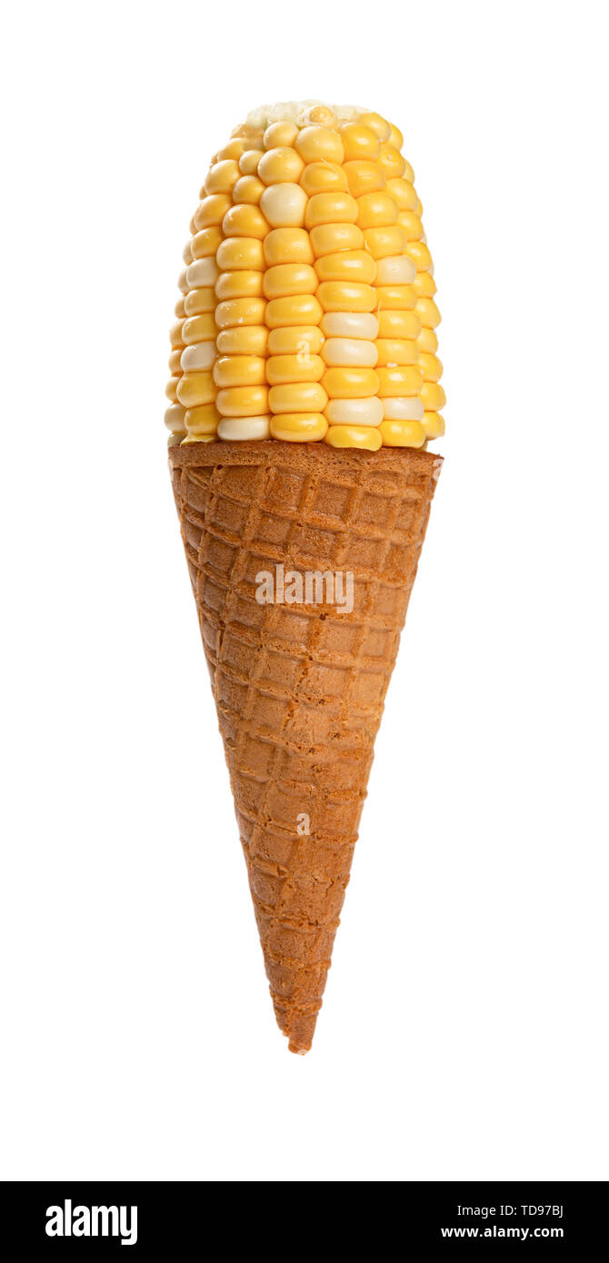ice cream cone with a piece of fresh maize on white background with
